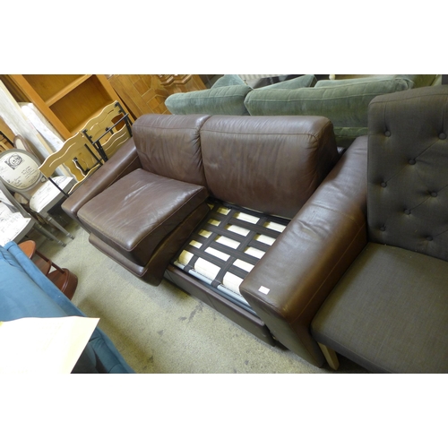 1698 - A brown leather two seater sofa bed