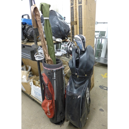 2086 - 4 bags of golf clubs