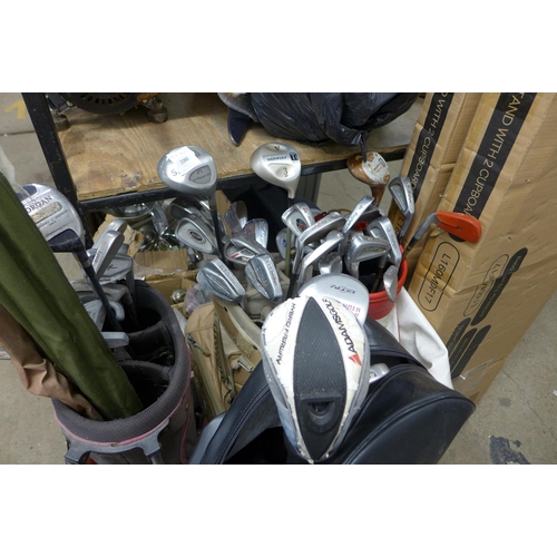 2086 - 4 bags of golf clubs