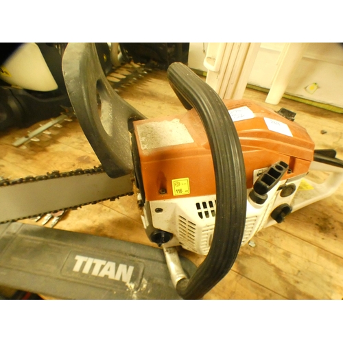 2374 - Titan and 1 other petrol driven chain saws