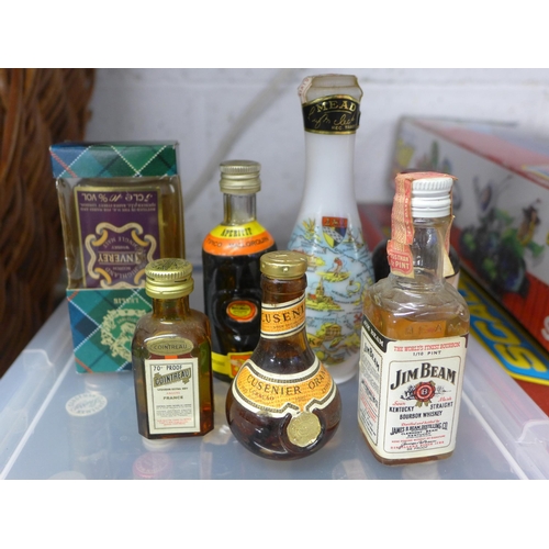 2230 - Plastic container of various minatures including whisky, sherry, etc.