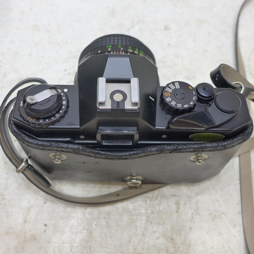 2249 - Cosina 35mm SLR camer in case and 50mm lens