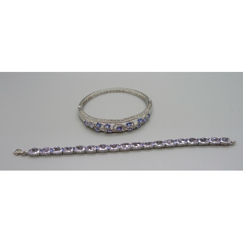 1127 - A silver bracelet and a bangle with purple stones