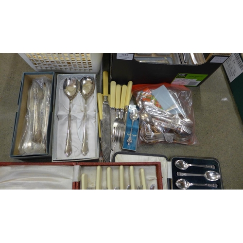 1141 - A large box of plated and stainless steel cutlery **PLEASE NOTE THIS LOT IS NOT ELIGIBLE FOR POSTING... 