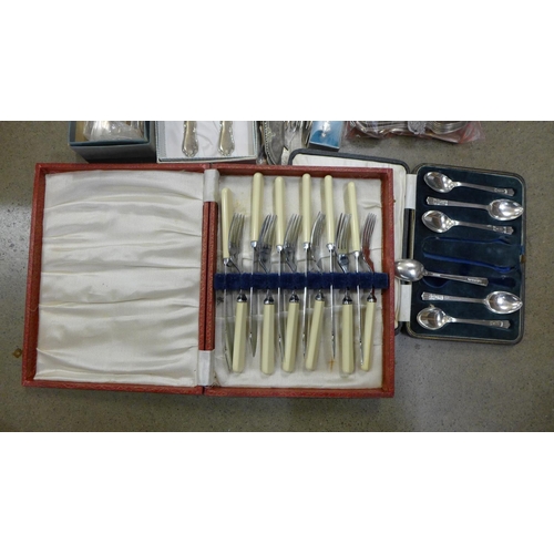 1141 - A large box of plated and stainless steel cutlery **PLEASE NOTE THIS LOT IS NOT ELIGIBLE FOR POSTING... 