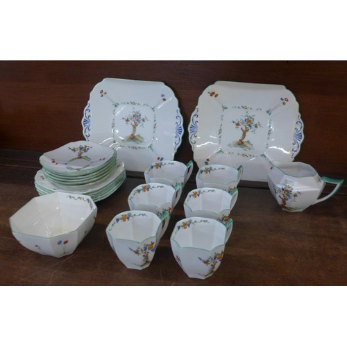 663 - A Shelley Queen Anne Crabtree pattern tea set, six setting and two bread and butter plates, one cup ... 