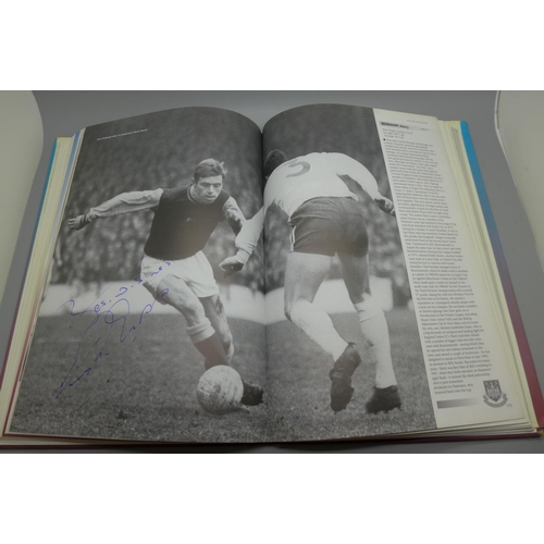 665 - West Ham United;- A Who's Who, Player by Player book containing approximately 86 signatures from for... 