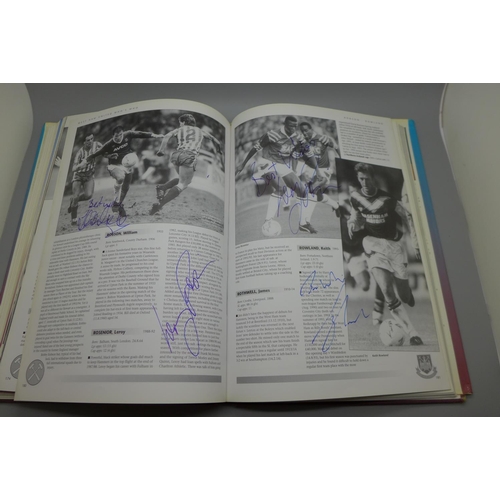 665 - West Ham United;- A Who's Who, Player by Player book containing approximately 86 signatures from for... 