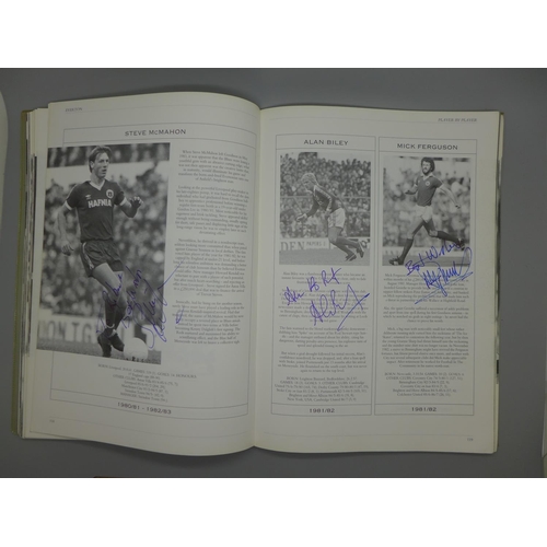 669 - Everton; a Player by Player book containing approximately 145 signatures from former players and man... 