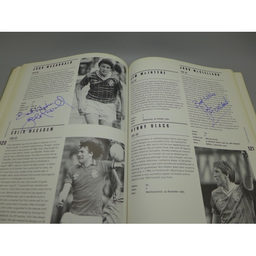 677 - Rangers: a Player by Player book containing approximately 40 signatures from former players and mana... 