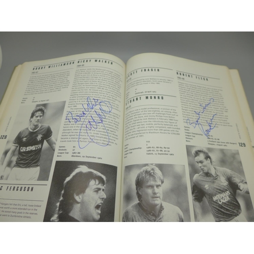 677 - Rangers: a Player by Player book containing approximately 40 signatures from former players and mana... 