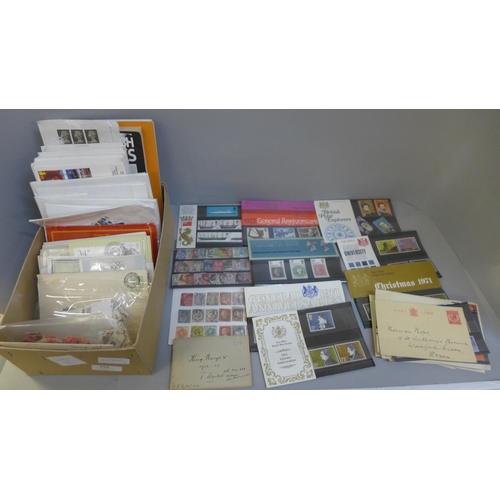 699 - Stamps; a box of GB stamps, covers, presentation packs, etc.