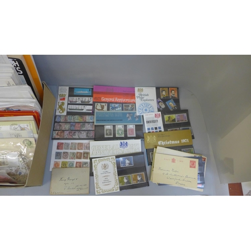 699 - Stamps; a box of GB stamps, covers, presentation packs, etc.