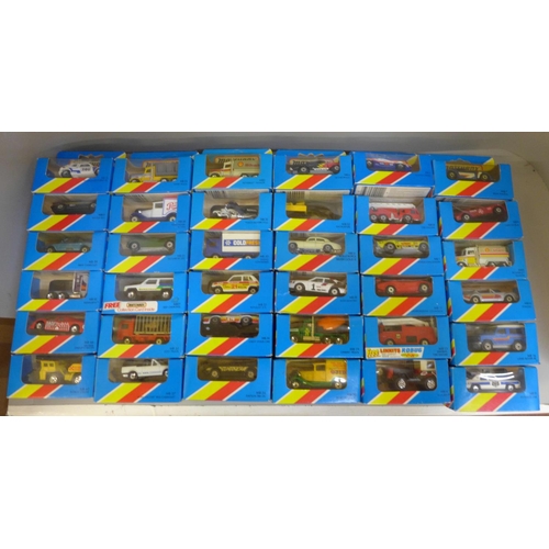 704 - A collection of seventy-two Matchbox model vehicles, all in original light blue boxes