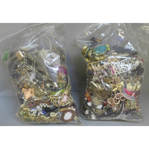 712 - Two bags of fashion jewellery