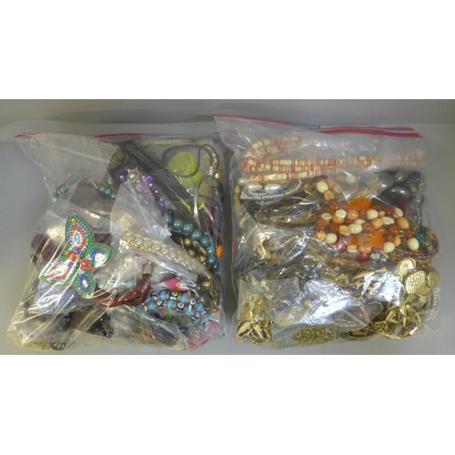 725 - Two bags of costume jewellery