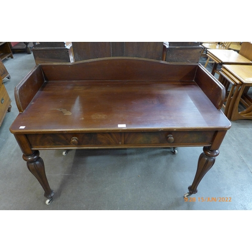 10 - A George IV mahogany two drawer writing table