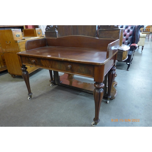 10 - A George IV mahogany two drawer writing table