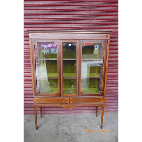 110d - An Edward VII inlaid mahogany display cabinet