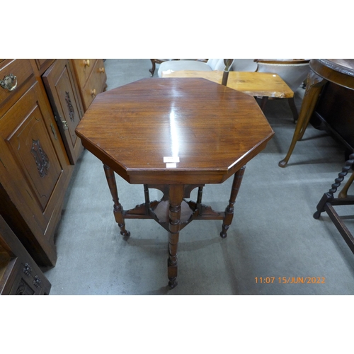 129 - A Victorian walnut octagonal occasional table