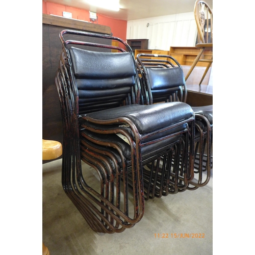 150 - A set of thirteen steel and vinyl stacking chairs