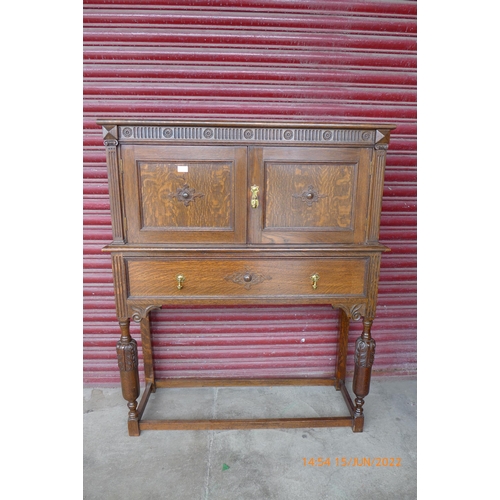 161a - A carved oak side cabinet