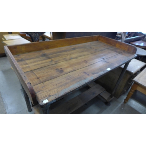 243 - An industrial steel and pine work table