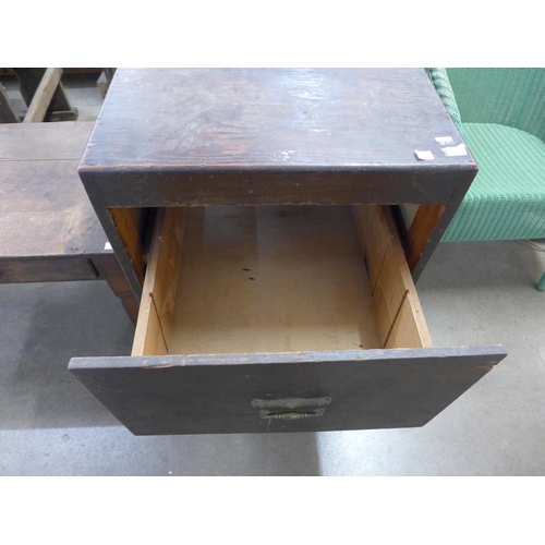 251 - An oak two drawer filing cabinet and a small French fruitwood coffee table