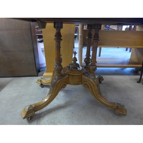 257 - A Victorian inlaid walnut oval tilt-top loo table, a/f