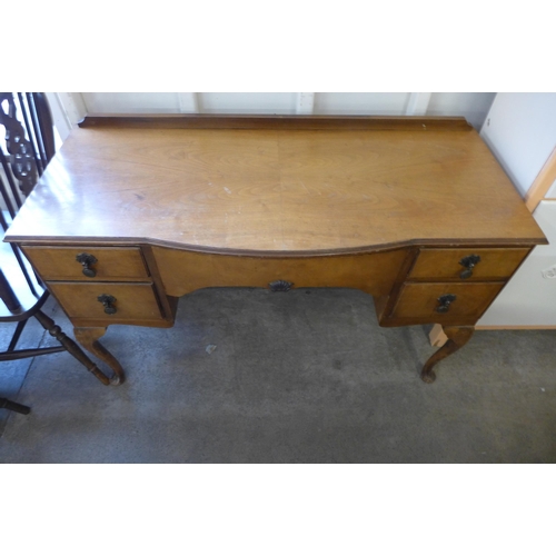 263 - A 1950's painted kitchen cabinet and a walnut dressing table