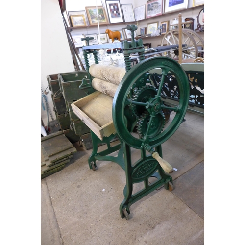 271 - A vintage painted cast iron mangle