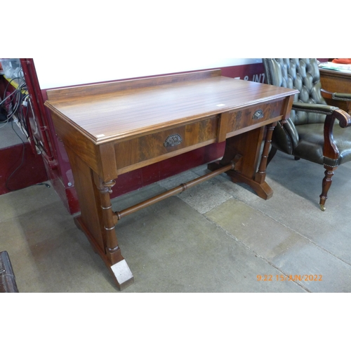 3 - A Victorian mahogany two drawer writing table