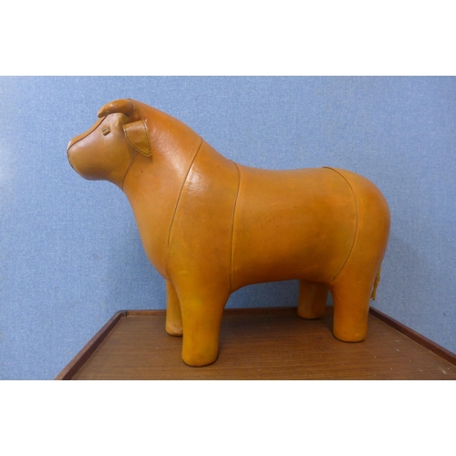 357 - A Liberty & Co. style brown leather bull shaped footstool