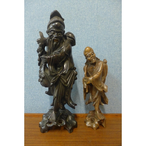 368 - Two Chinese carved wood figures