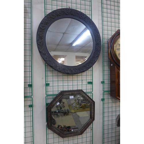 380 - An octagonal oak framed mirror and one other