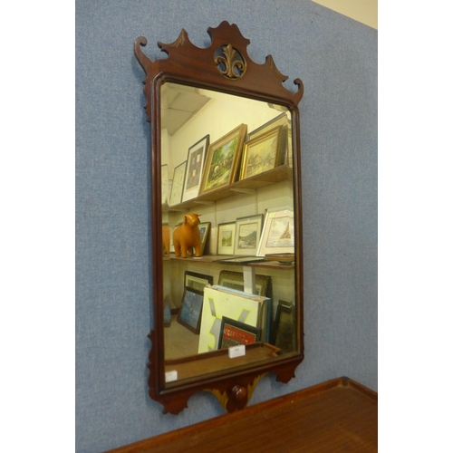 388 - A George II style mahogany and parcel gilt framed mirror