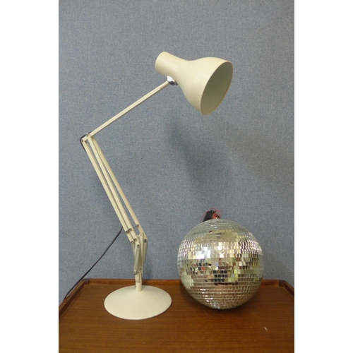 394 - A white metal anglepoise desk lamp and a mirrored disco ball