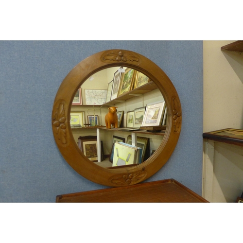 399 - A circular pine framed mirror