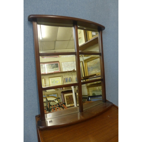 403 - A mahogany cathedral style mirror