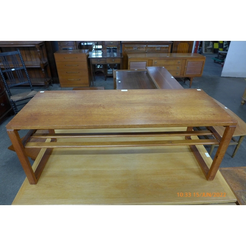 66 - A teak coffee table