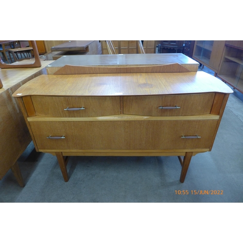 94 - A small teak sideboard