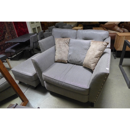 1666 - A Coco four seater sofa, love seat and footstool