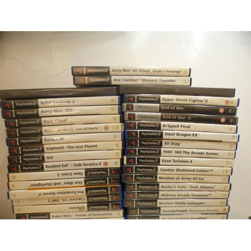 2163b - Two PS2 consoles, approx 40 games and accessories including rare games