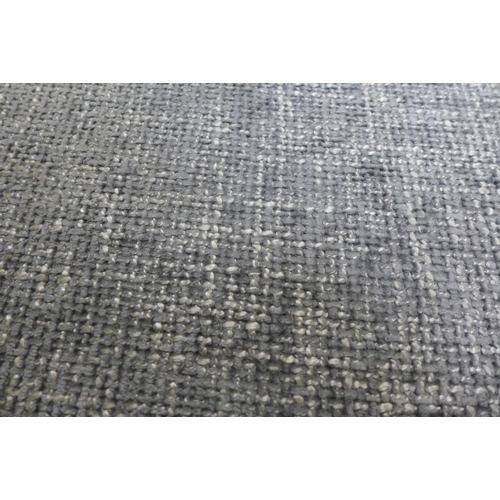 1531 - A dark grey upholstered ottoman footstool