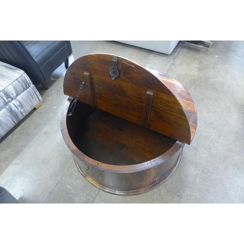 1592 - A mango wood large round storage coffee table - damaged