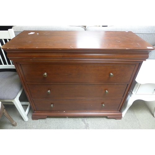 1628 - A chestnut three drawer chest - marked