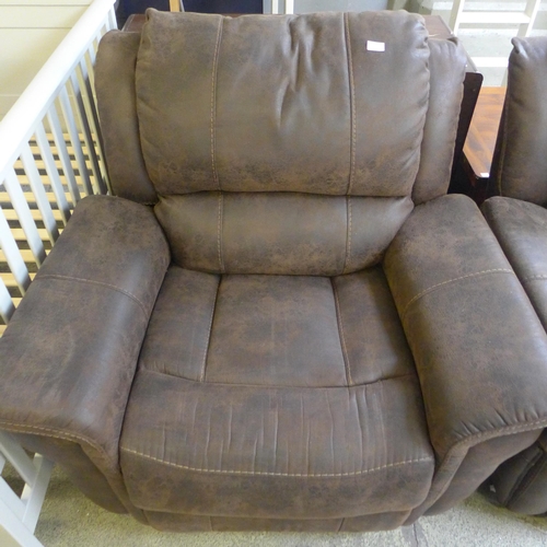 1674 - A chocolate brown reclining armchair (used)