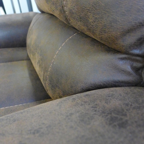 1674 - A chocolate brown reclining armchair (used)