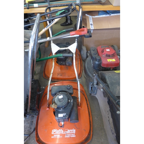 2322 - Two Petrol 2-stroke hover mowers