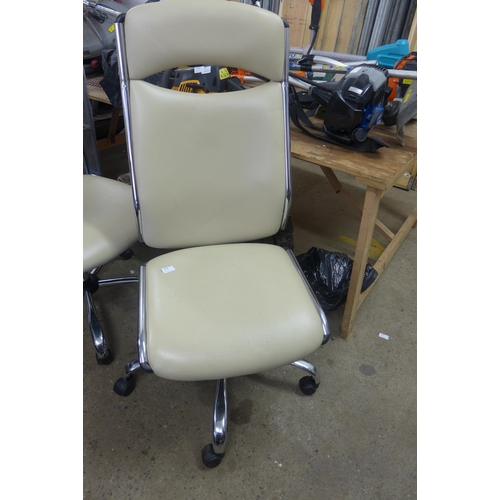 2338 - Two cream leather/chrome cantilever rise/reclining chairs